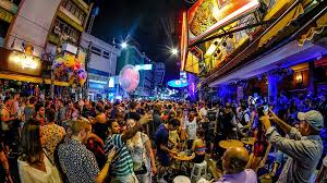 Nightlife and street vendors along the lively Khao San Road.