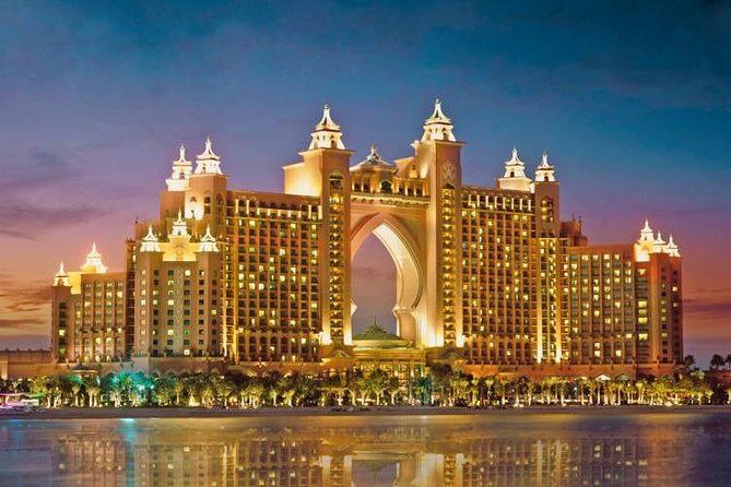 Atlantis The Palm luxury resort illuminated at dusk in Dubai